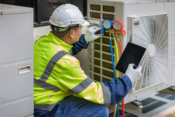 Professional Furnace Repair technician working in Hampton, IL